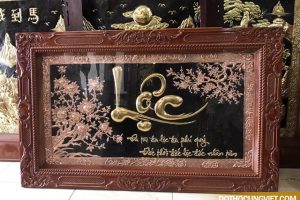 Tại sao nên treo tranh chữ bằng đồng trong nhà